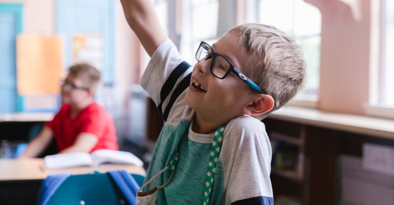 First-Year Students - Boy in Green Shirt Wearing Eyeglasses