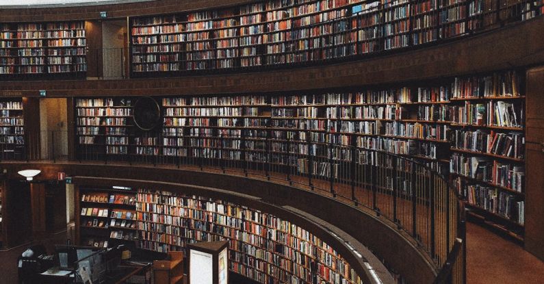 Renting Textbooks - Brown Wooden Shelf With Books