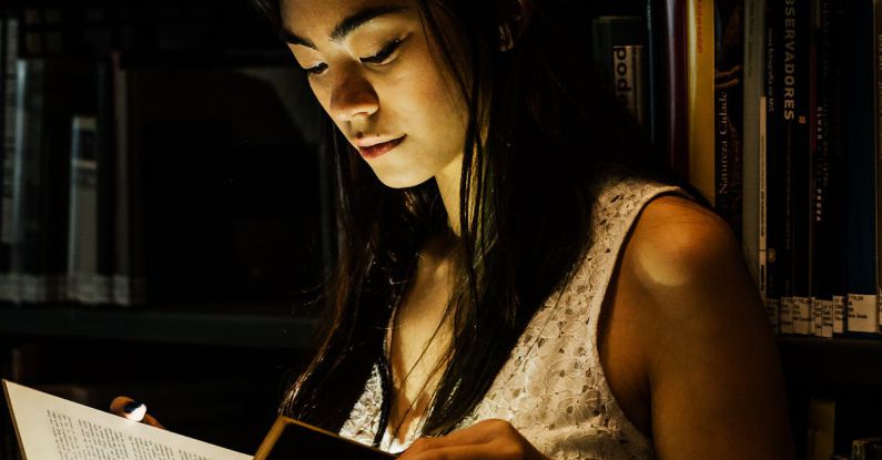 Free Textbooks - Photo Of Woman Reading Book